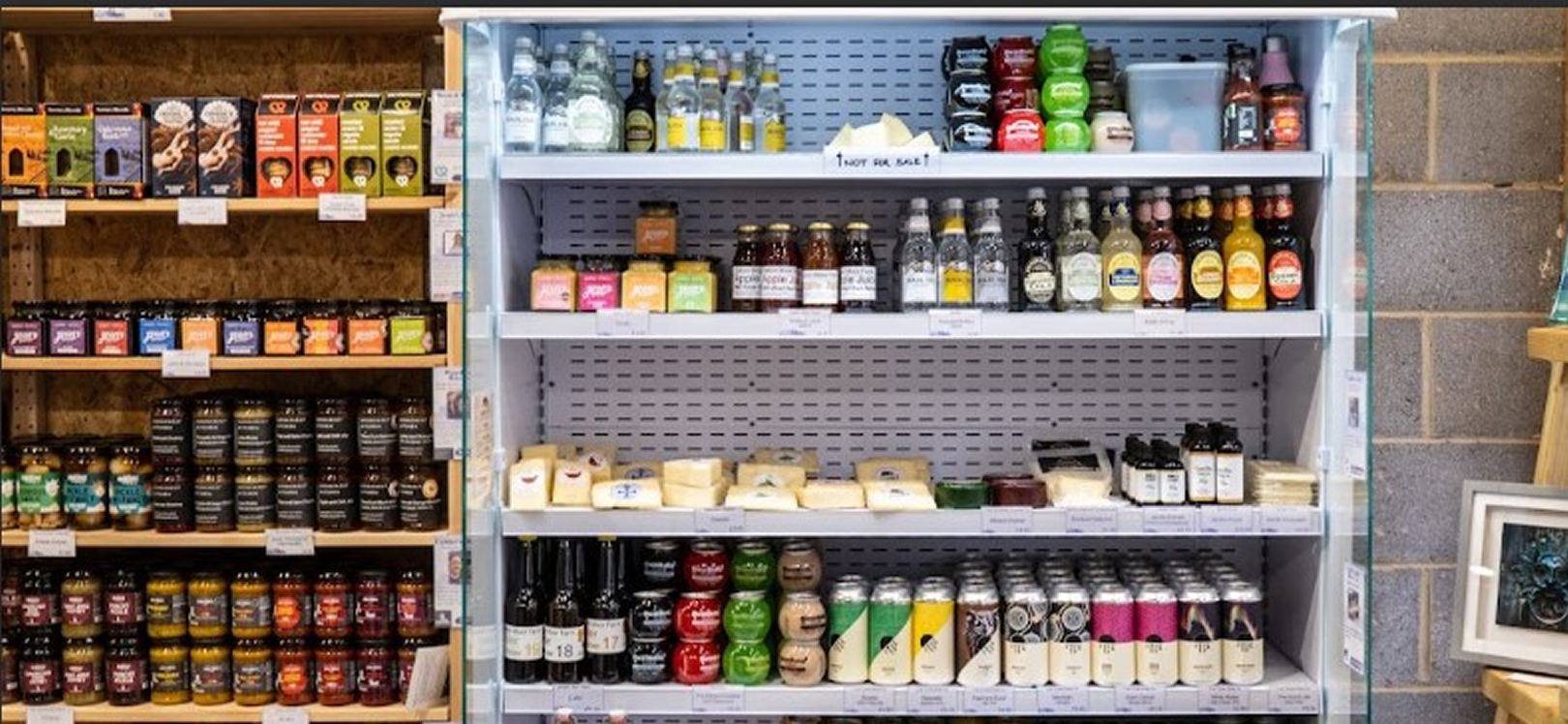 Shelves showing local produce in the shop