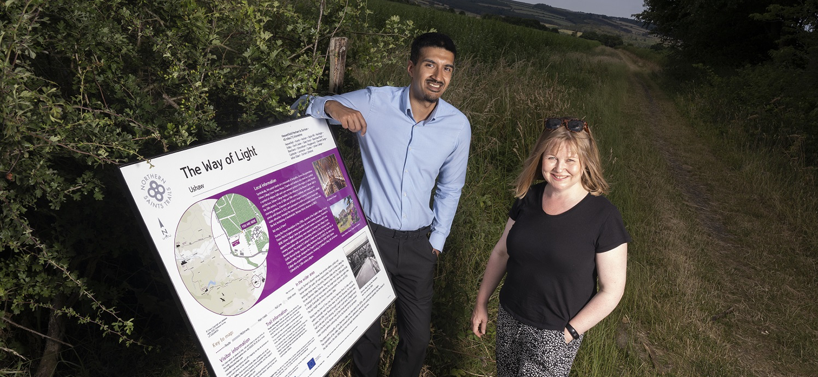 Sanjay Gidda, digital marketing assistant at Ushaw Historic House, Chapels and Gardens, and Cllr Elizabeth Scott, Durham County Council’s Cabinet member for economy and partnerships and a director of the Visit County Durham Limited board, at one of the new Northern Saints Trails interpretation panels near Ushaw Historic House, Chapels and Gardens.