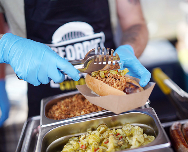 man preparing food at Seaham Food Festival