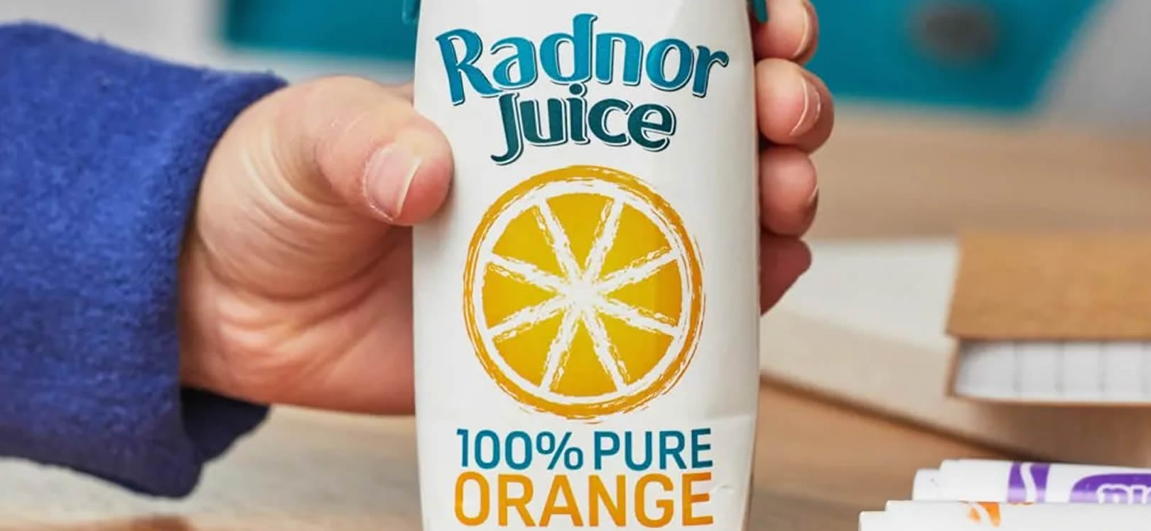 Orange Radnor juice in a school bag