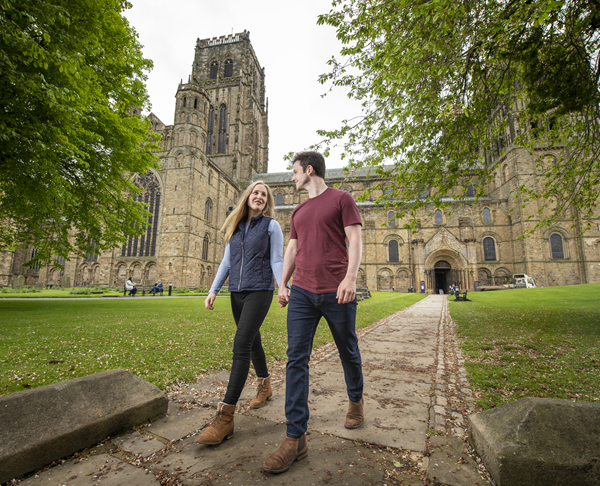 Couple walking at Durham Cathedral