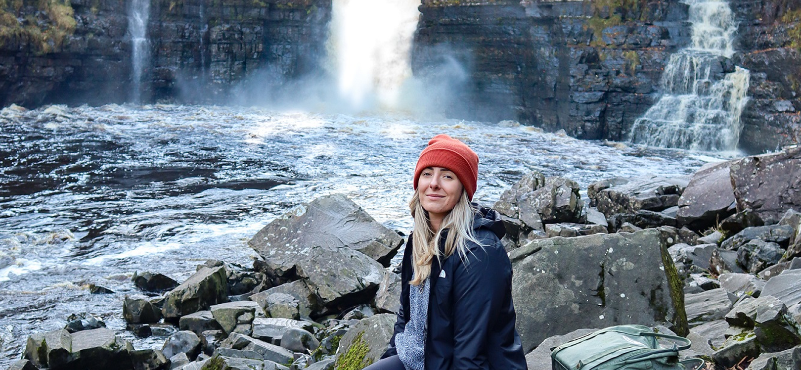 A woman sat at High Force