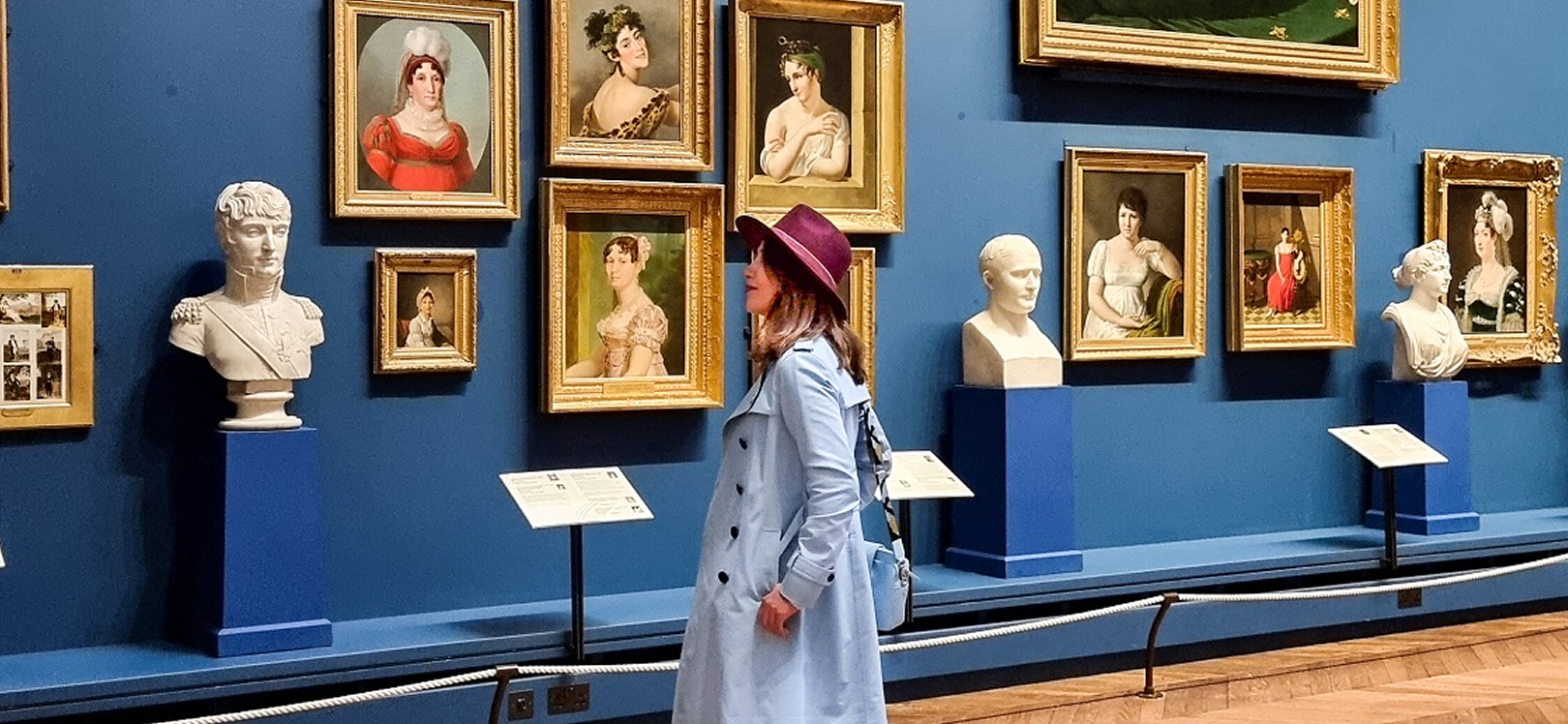 A woman looking at an exhibition at Bowes Museum