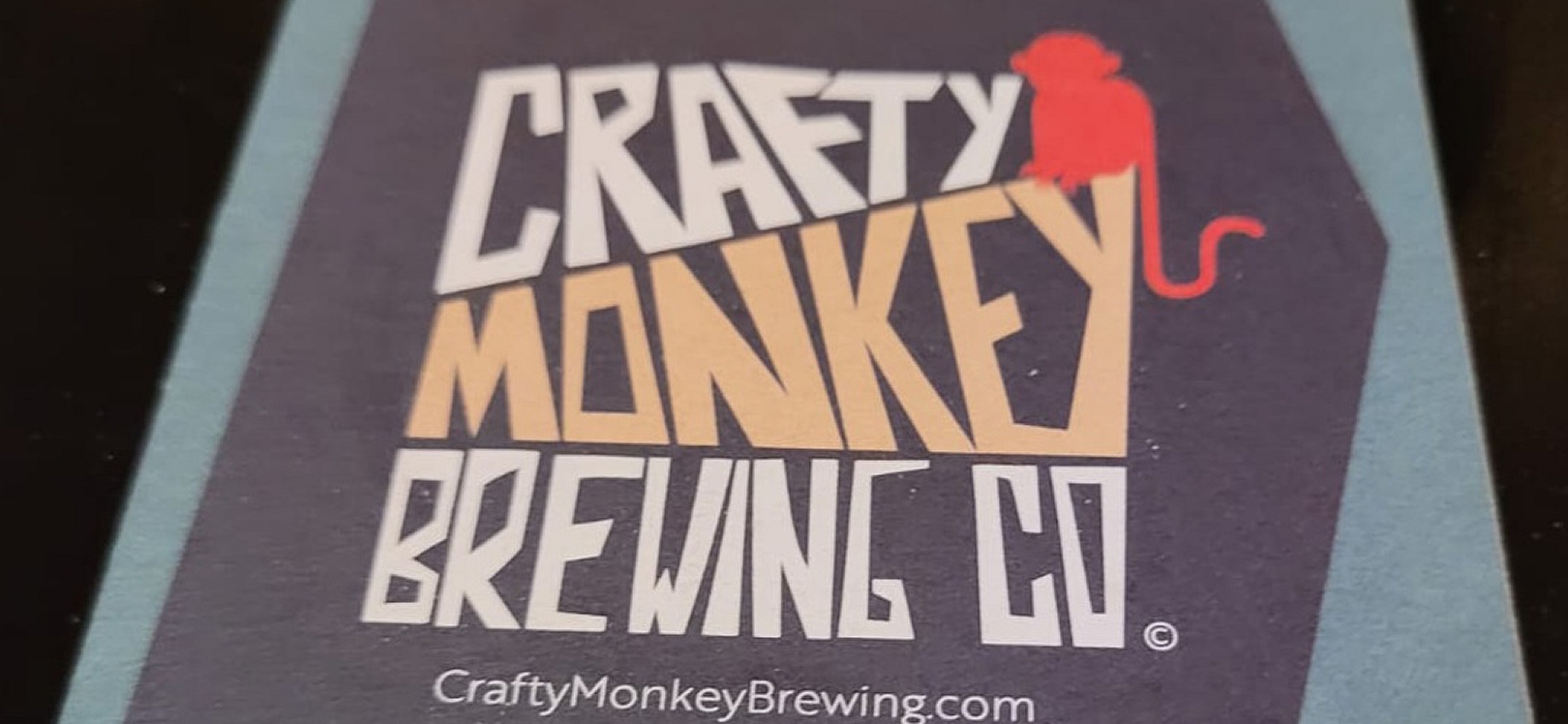 Crafty Monkey beer mat logo