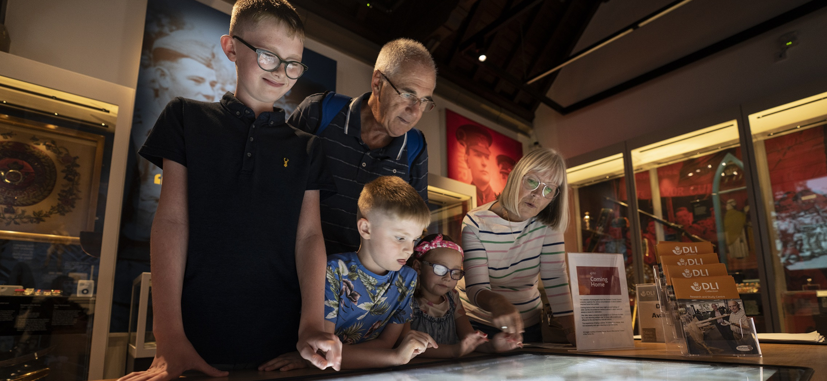 A family looking at an exhibition