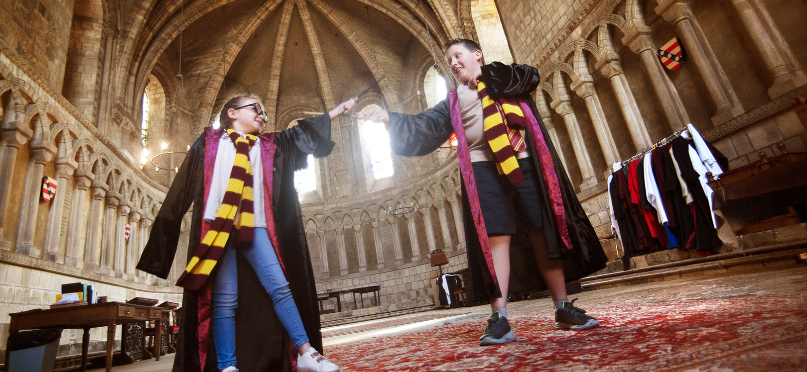 Kids pretending to be Harry Potter