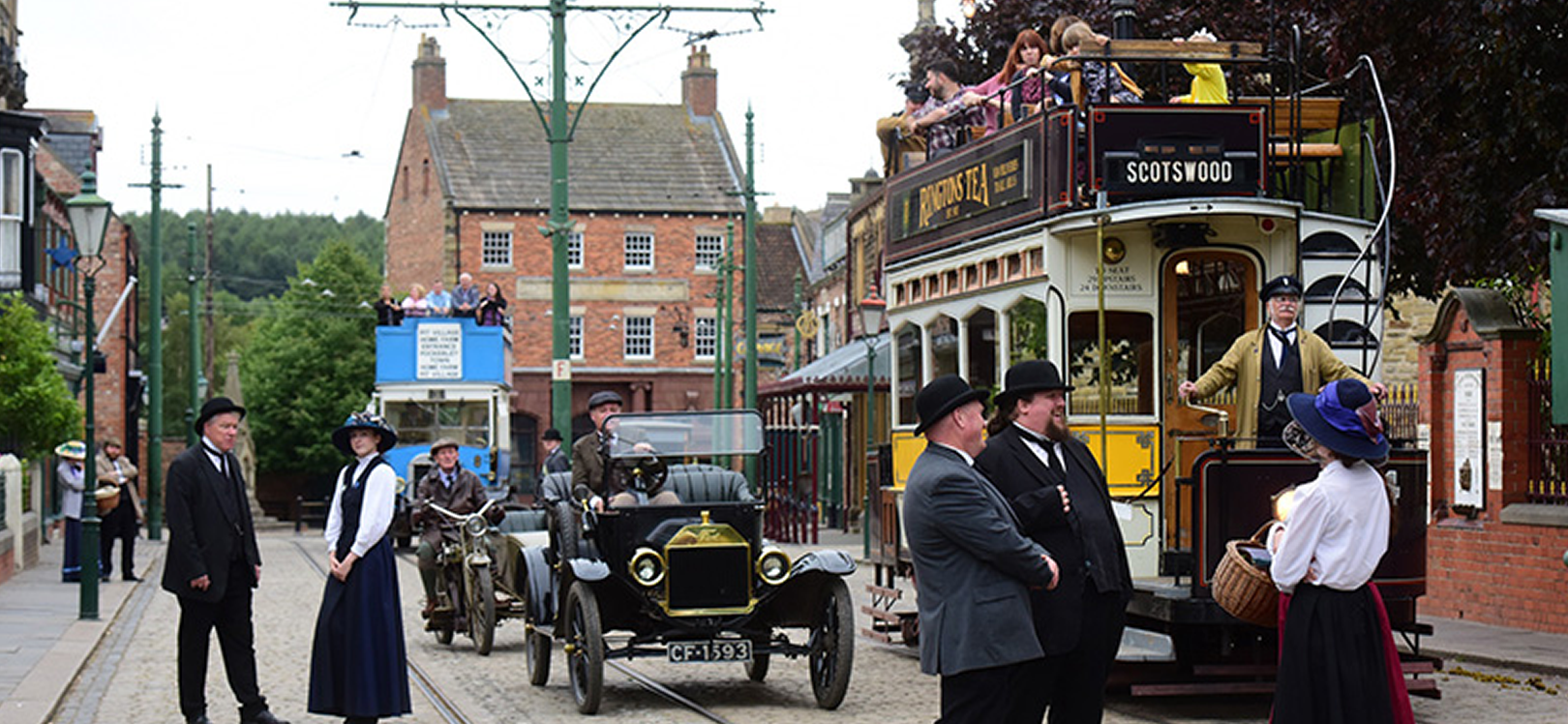 Beamish 1900s Town. People stood in the street.