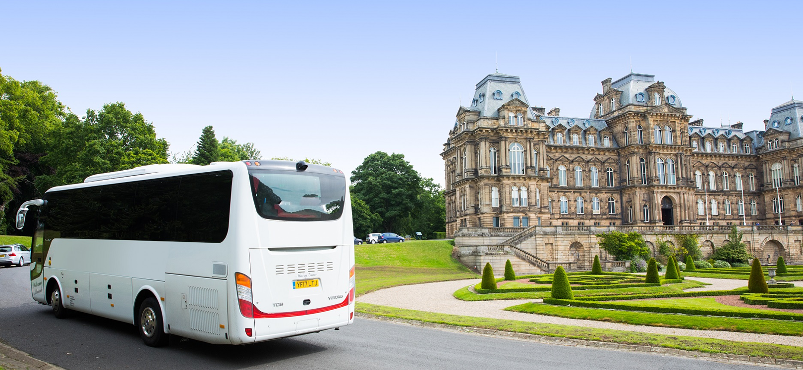 A coach outside of the Bowes Museum