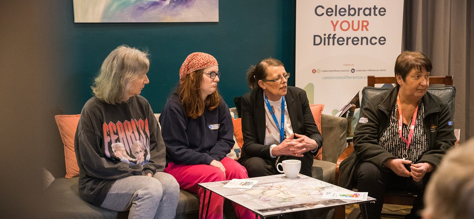 A group of people sat around talking
