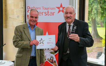 Duncan Peake (Left), Interim Chair of Visit County Durham, with Durham Tourism Superstar 2023 winner Ian Bean, of Beamish, The Living Museum of the North