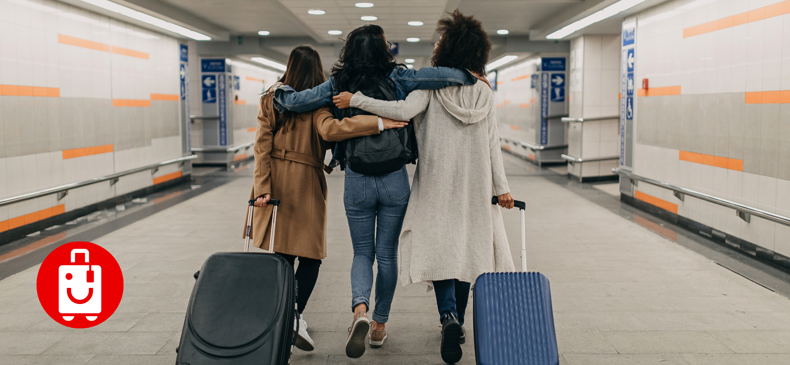 Three friends with suitcases