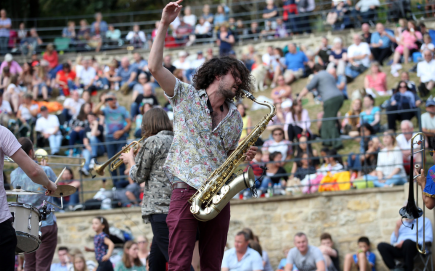 A man playing a saxophone at Durham Brass