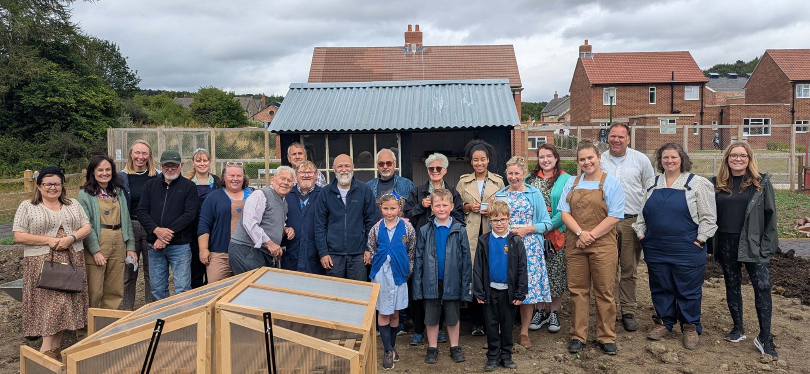 A large group of people in an allotment