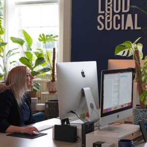 A woman sat at a desk in a n office