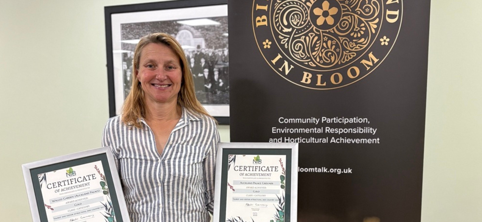 Sharon Bridge, senior gardener at The Auckland Project, accepting the awards on behalf of the charity.