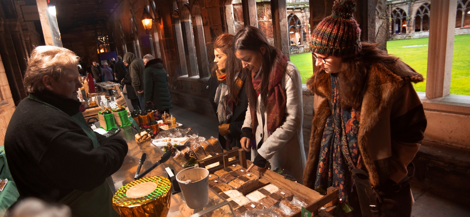 People at a market stall at Durham Christmas Markets